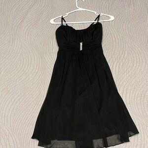 Women’s size small black dress.